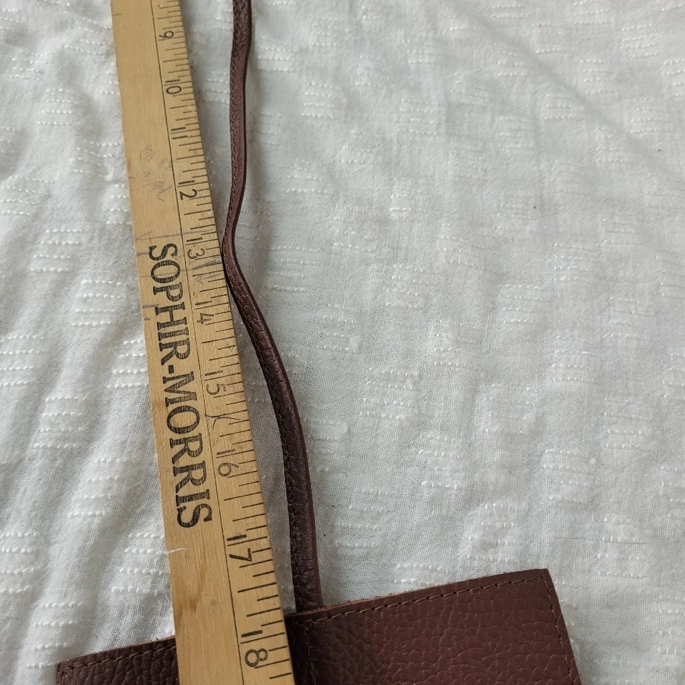 Mark & Graham brown pebbled leather charger rollup pockets tie closure minimal